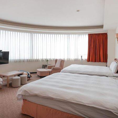 Herkang Hotel Тайджун Екстериор снимка